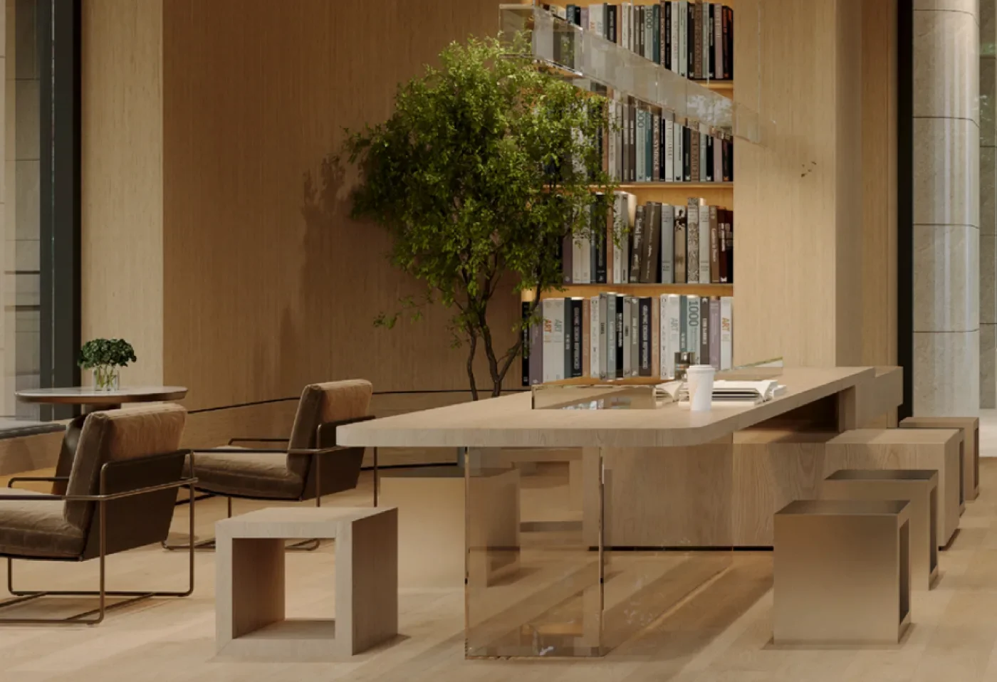 Belgravia Place seating area with bookshelves, a long table, stools and an indoor tree.