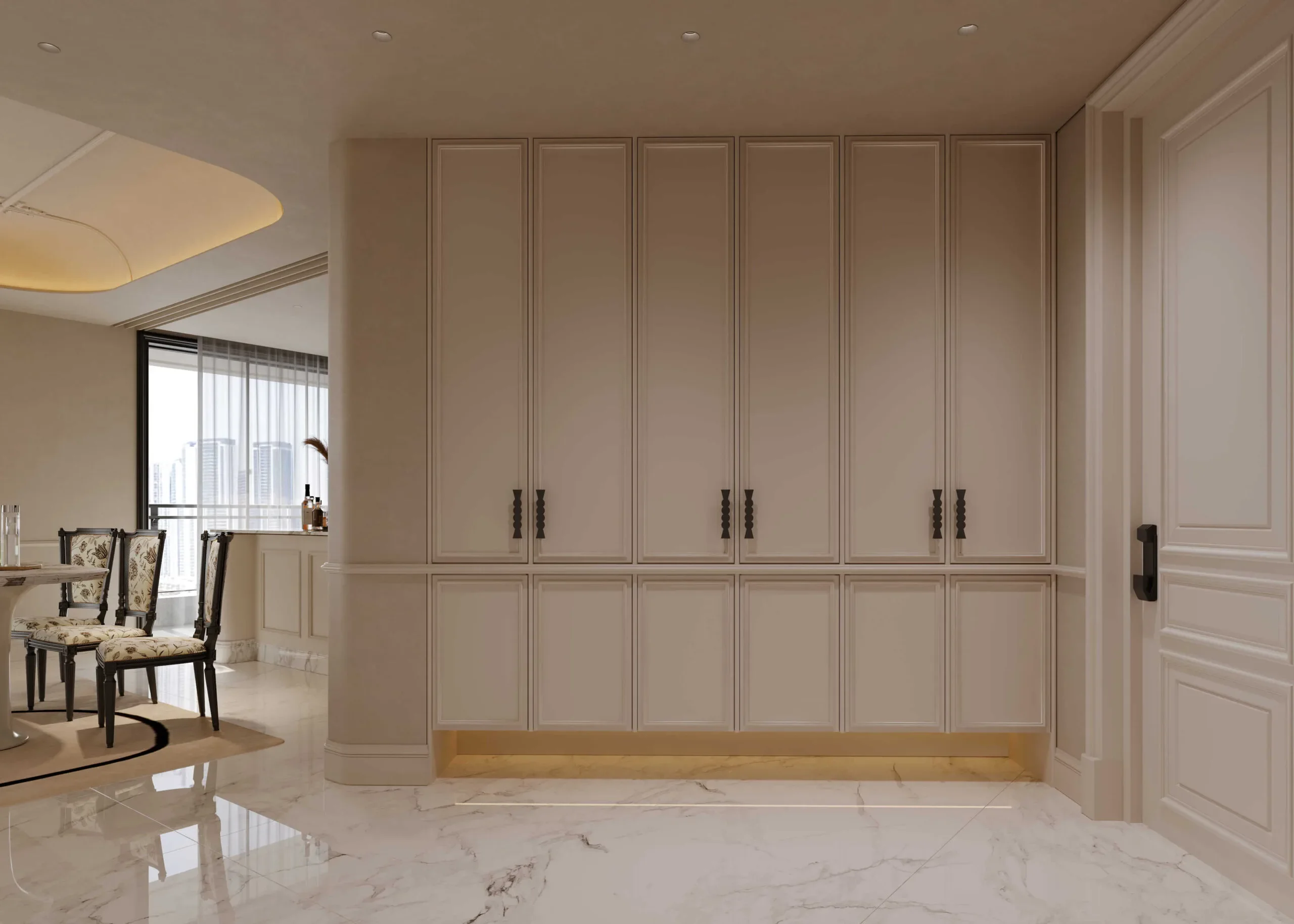 Cream built-in cabinets with dark handles beside the dining area at Brookside Oak Residency.