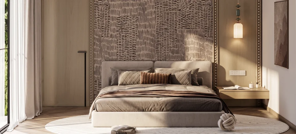 Bedroom at Cheval Riverside with an upholstered bed, patterned feature wall and a bedside pendant light.