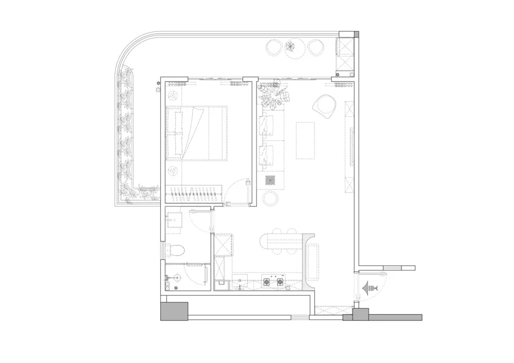 One-bedroom floor plan at Luminara Westlands showing living space, kitchen, bathroom and a curved balcony.