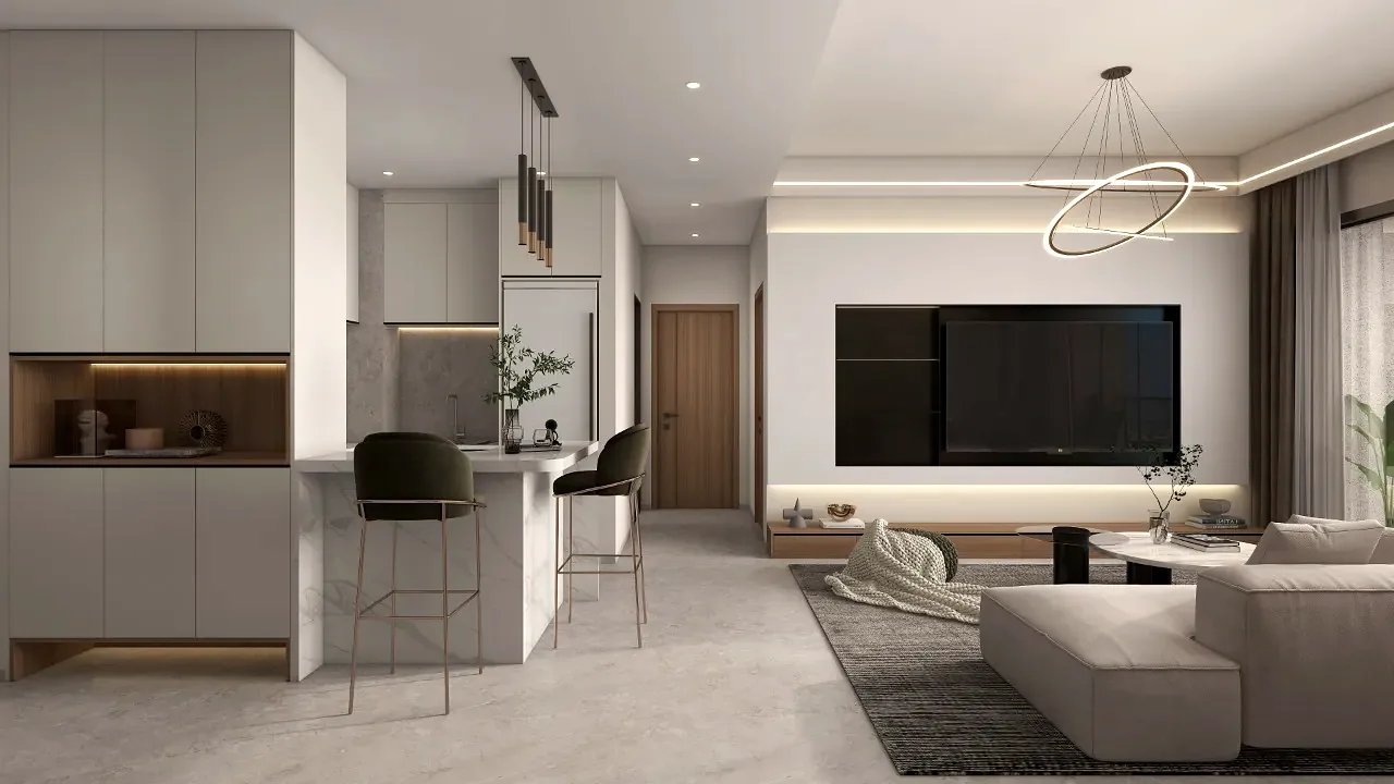 Open-plan living area and kitchen at Riara One Residency with breakfast bar and sectional sofa.