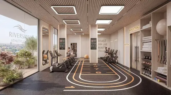 Gym rendering at Riverside Times Apartments with cardio equipment, weights and marked exercise lanes.