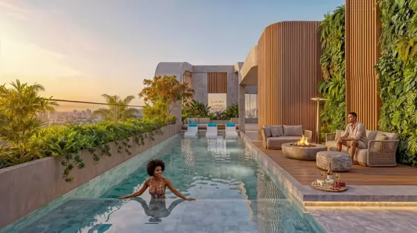 Rendering of Riverside Times Apartments’ swimming pool with poolside seating and vertical gardens.