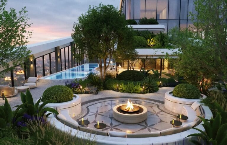 Santorini Residences terrace rendering with circular seating, a central fire pit, greenery and a pool.