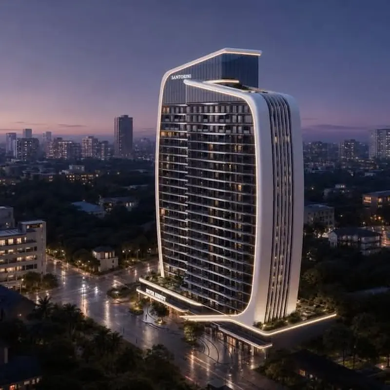 Exterior rendering of Santorini Residences in Westlands at dusk, showing a curved, illuminated facade and surrounding buildings.